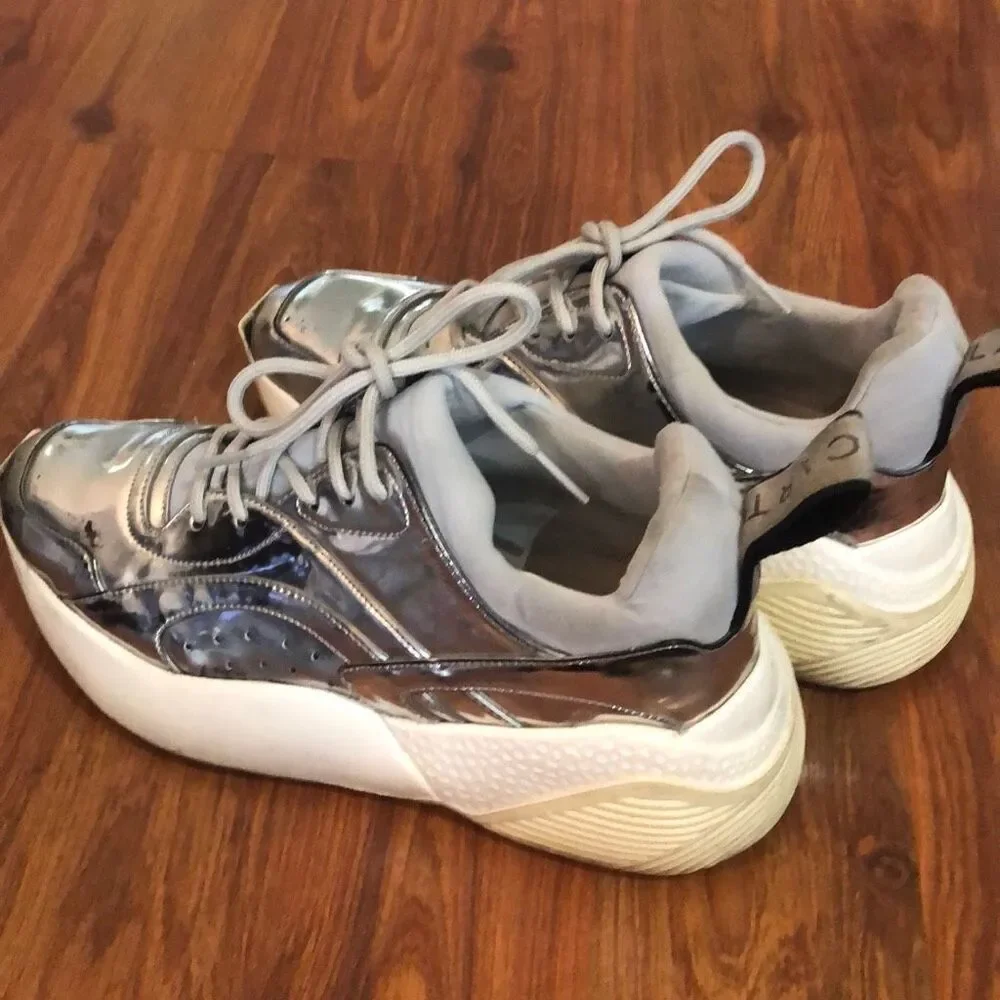 Stella McCartney silver Text sole sneakers, size 7